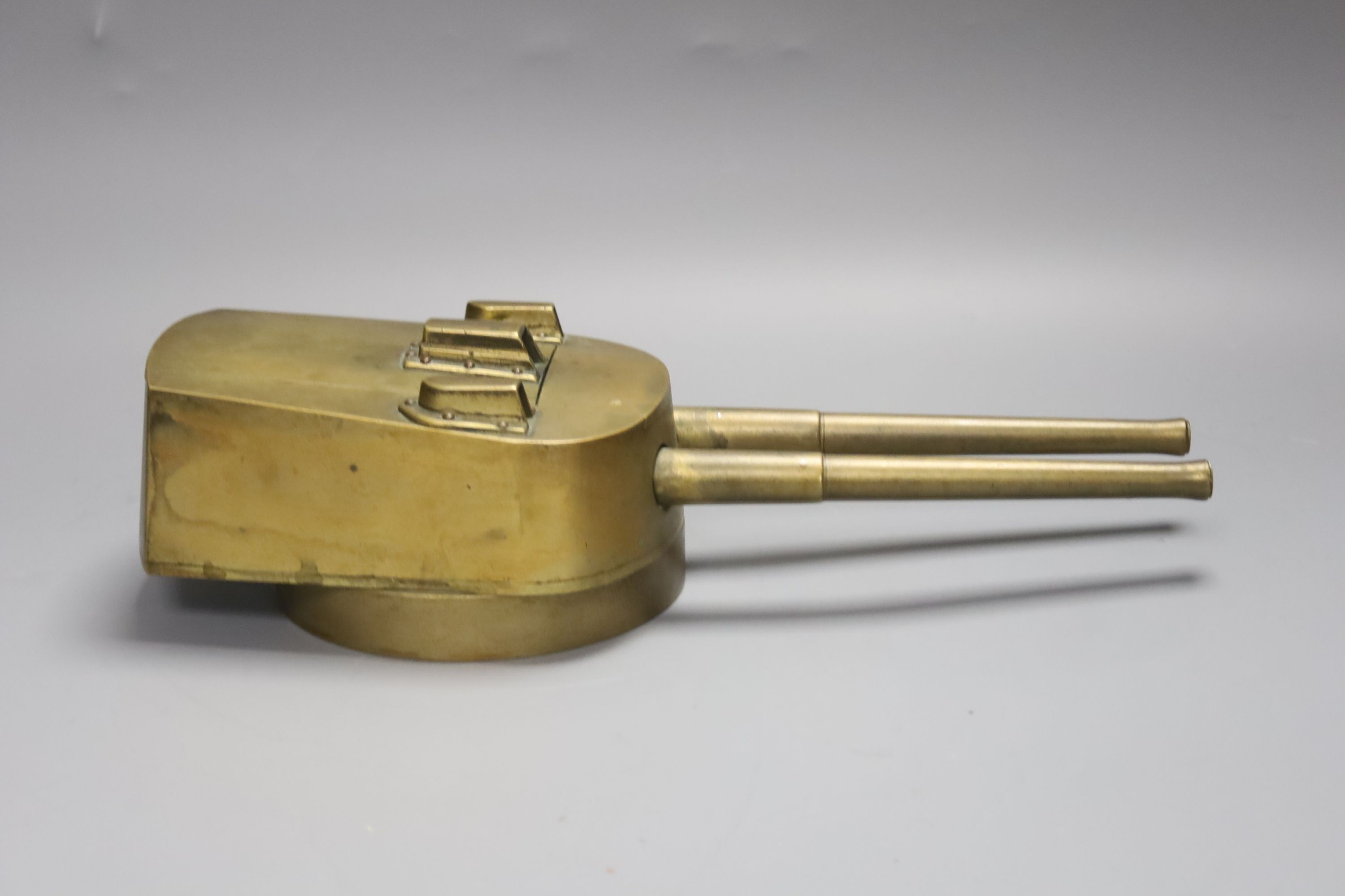 An early 20th century trench art gun turret cigarette case, cedar wood lining, 29cm